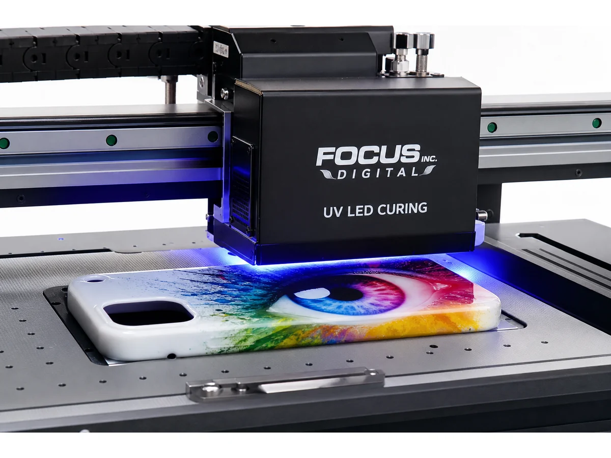 UV flatbed printer in action printing vibrant CMYK white ink with LED instant cure